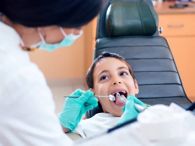Clear to launch best dental marketing - kid on the dentist