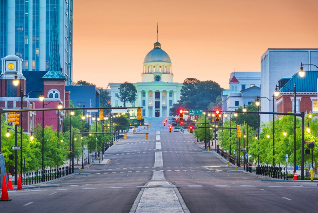 Montgomery, AL skyline at dawn with the state capitol in view, symbolizing the strategic and authoritative dental marketing expertise of Clear to Launch Dental Marketing for Montgomery's dental industry.