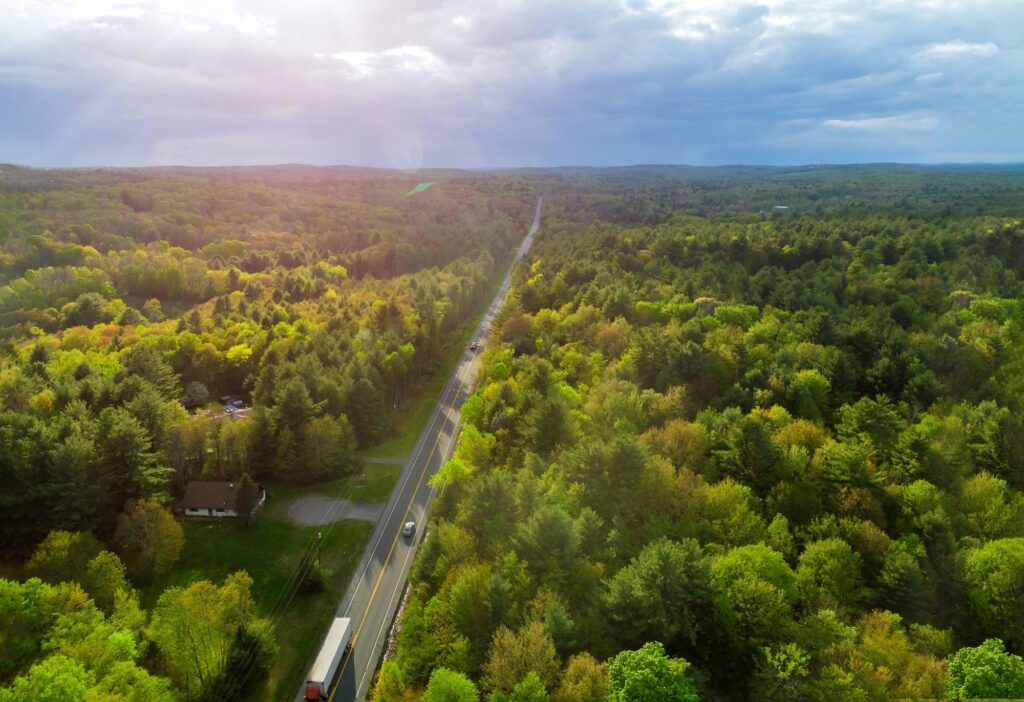 Scenic road winding through the Pocono Mountains, near Allentown, PA, illustrating the natural beauty and journey toward success with Clear to Launch Dental Marketing' dental marketing for Allentown dental practices.