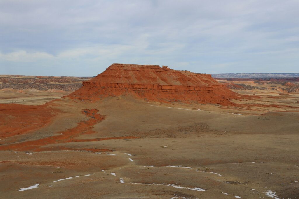 Scenic view of a red sandstone butte in Casper, WY, embodying the robust and enduring dental marketing strategies of Clear to Launch Dental Marketing for Casper dental practices.