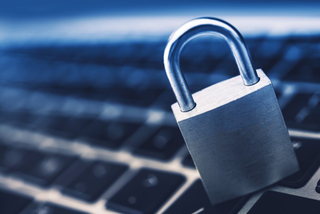 lock symbol on keyboard representing secure dental marketing practices and hipaa compliant patient data protection with clear to launch dental marketing