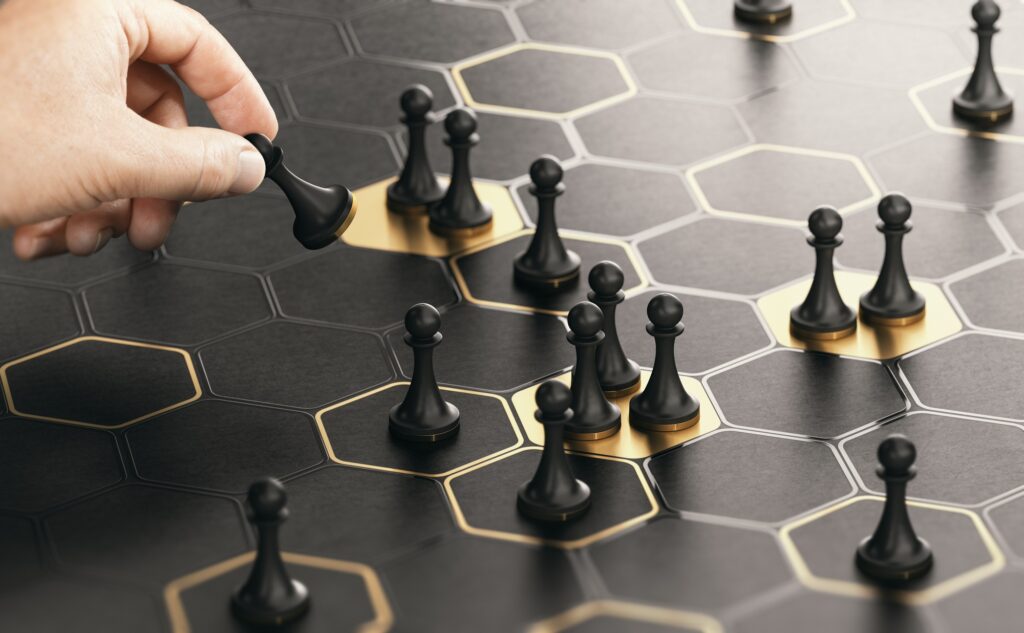 Strategic placement of game pieces on a hexagonal board representing Clear to Launch Dental Marketing’s approach to Google Ads strategy for dental practices in 2025